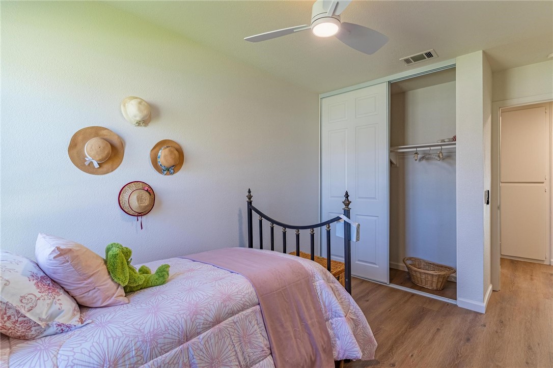 7738 Encinitas Avenue Fontana, CA 92336 - Photo 24 of 35 a bedroom with bed and a window