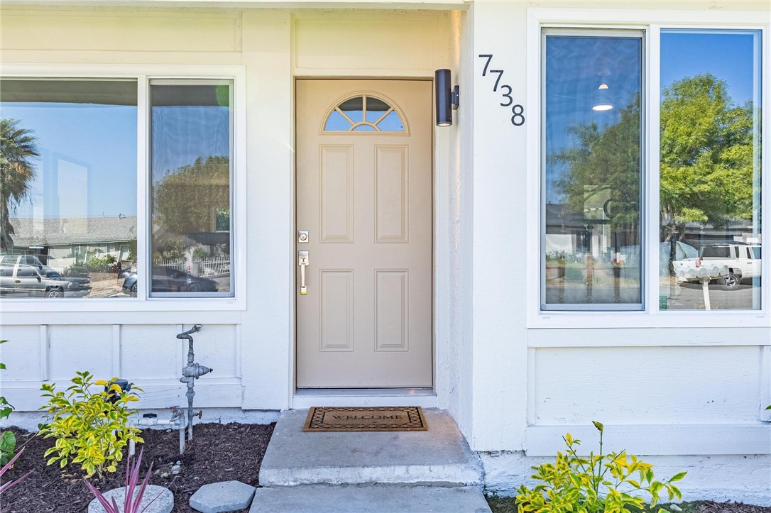 7738 Encinitas Avenue Fontana, CA 92336 - Photo 5 of 35 a front view of a house
