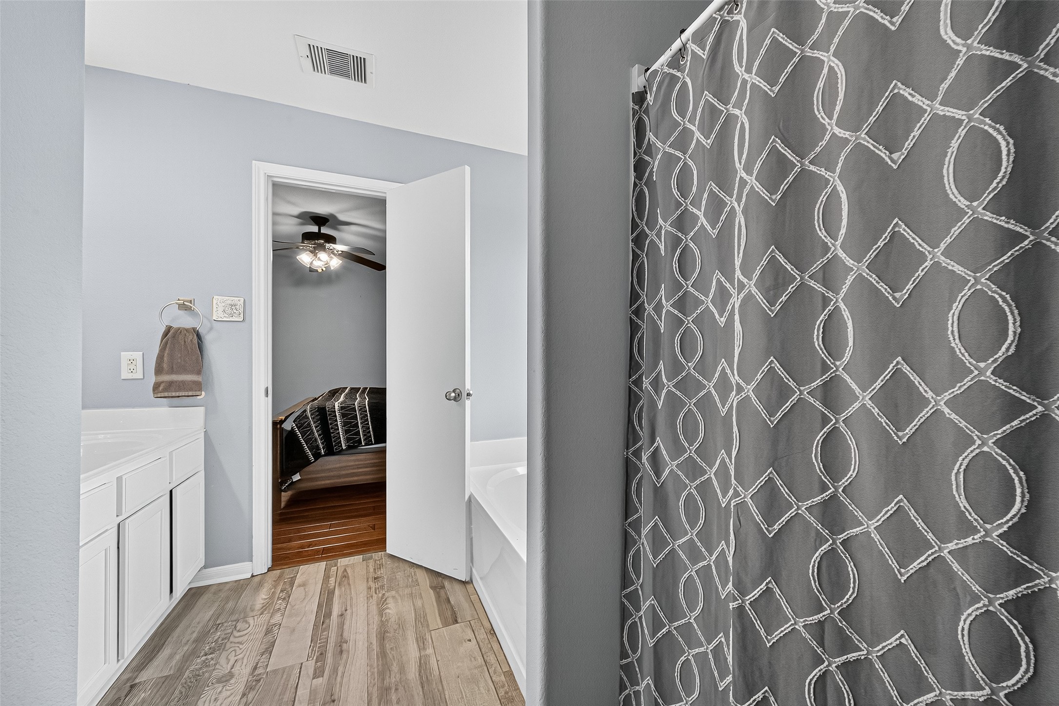 919 Wild Cotton Road Rosenberg, TX 77471 - Photo 12 of 21 a view of a bedroom with a door and a rug