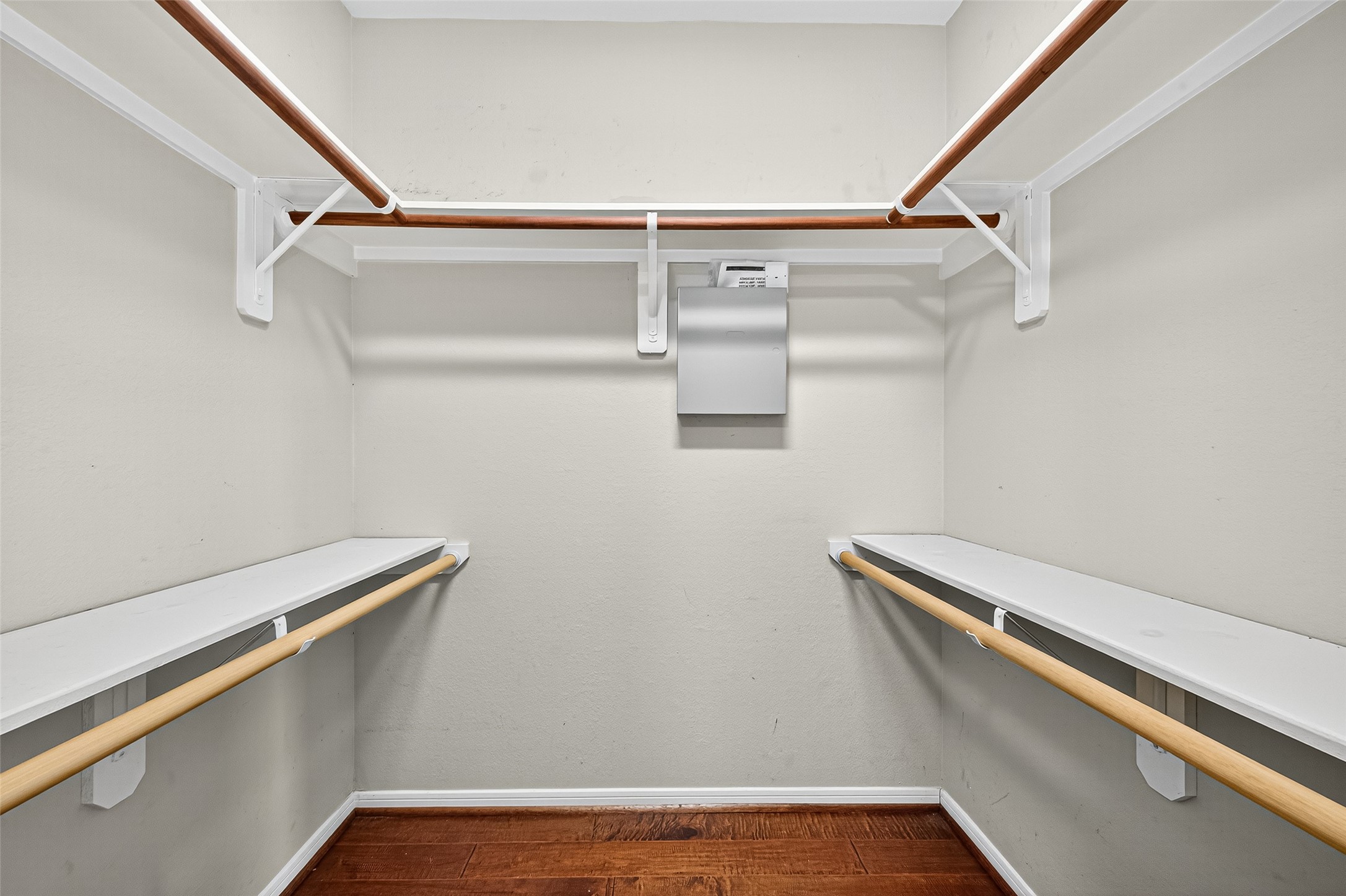 919 Wild Cotton Road Rosenberg, TX 77471 - Photo 13 of 21 a view of a room with racks on the wall