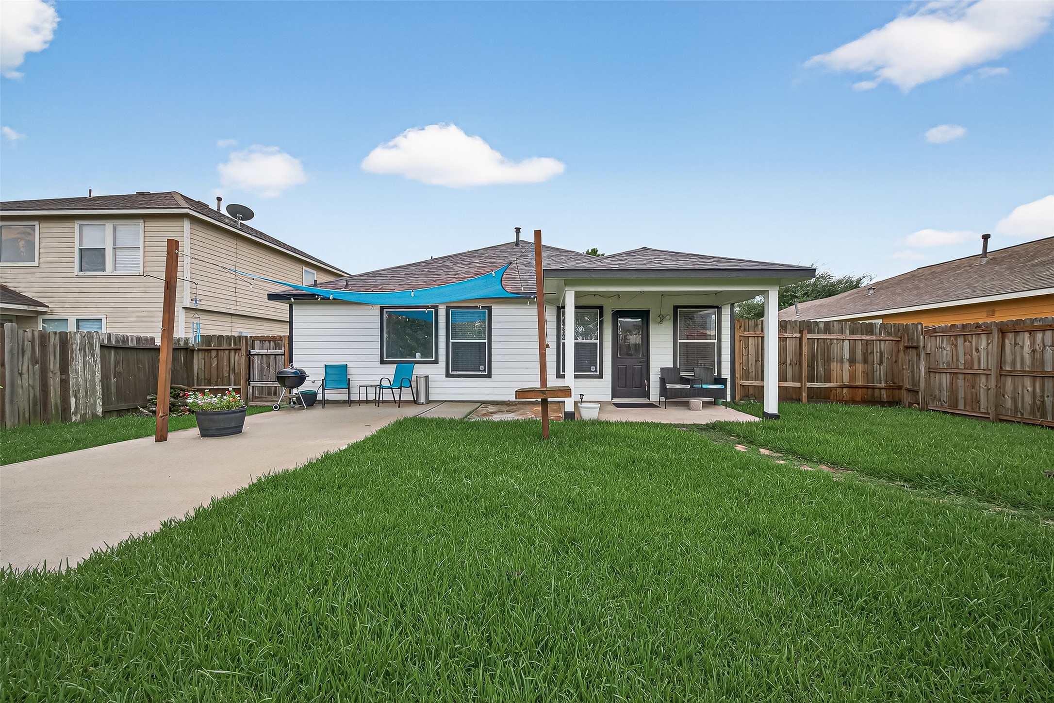 919 Wild Cotton Road Rosenberg, TX 77471 - Photo 17 of 21 a view of a yard in front of house