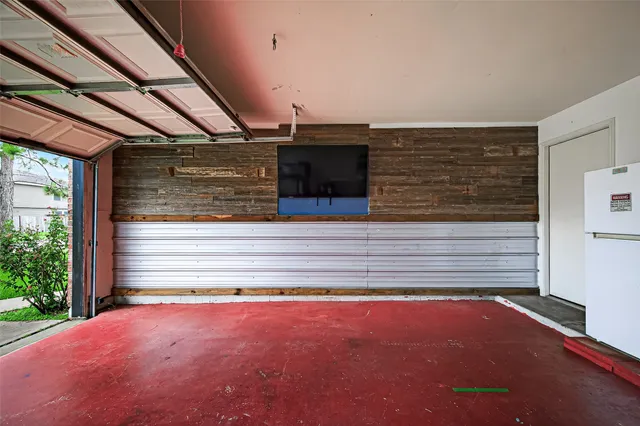 a view of house with backyard