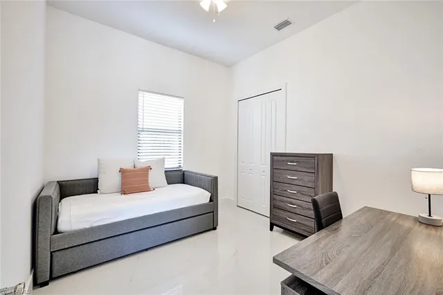 a kitchen with a stove and a sink