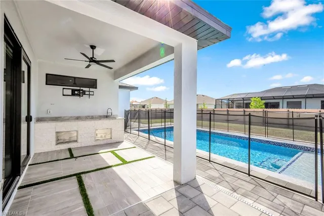 a view of a living room and a ceiling fan