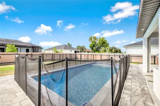 a view of a balcony with yard