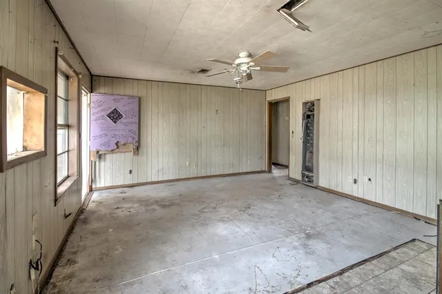 an empty room with windows