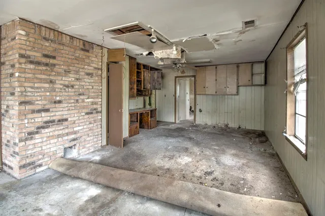 an empty room with windows