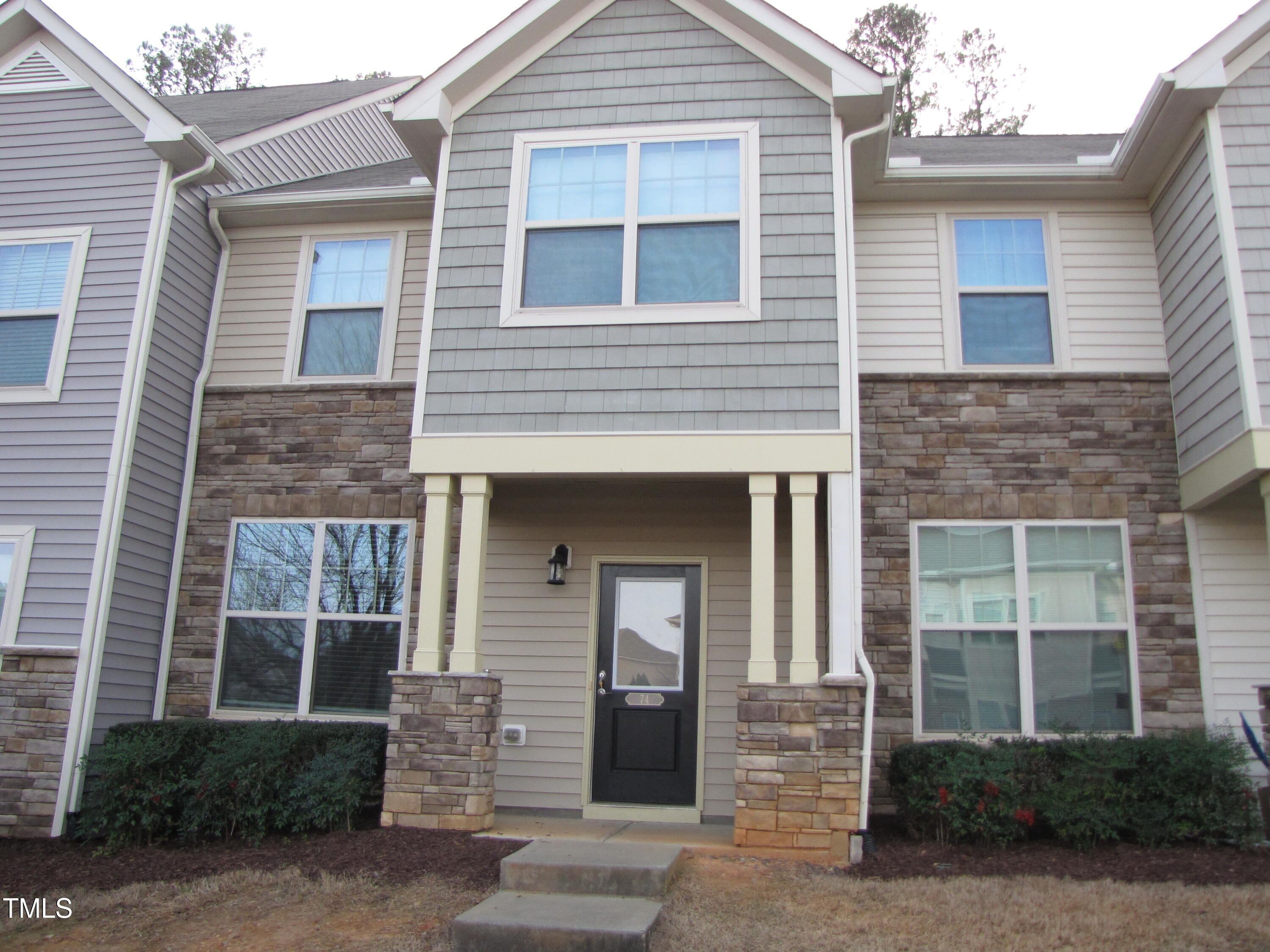 74 Pocono Drive Durham, NC 27705 - Photo 1 of 14 a front view of a house