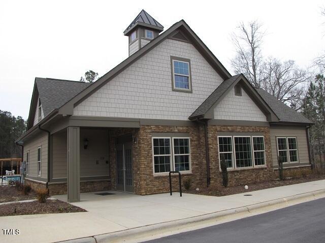 74 Pocono Drive Durham, NC 27705 - Photo 12 of 14 a front view of a house with a yard and garage
