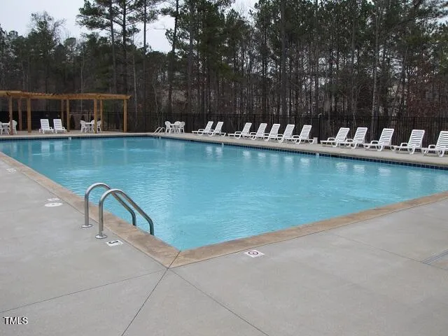 a view of a lake with sitting area