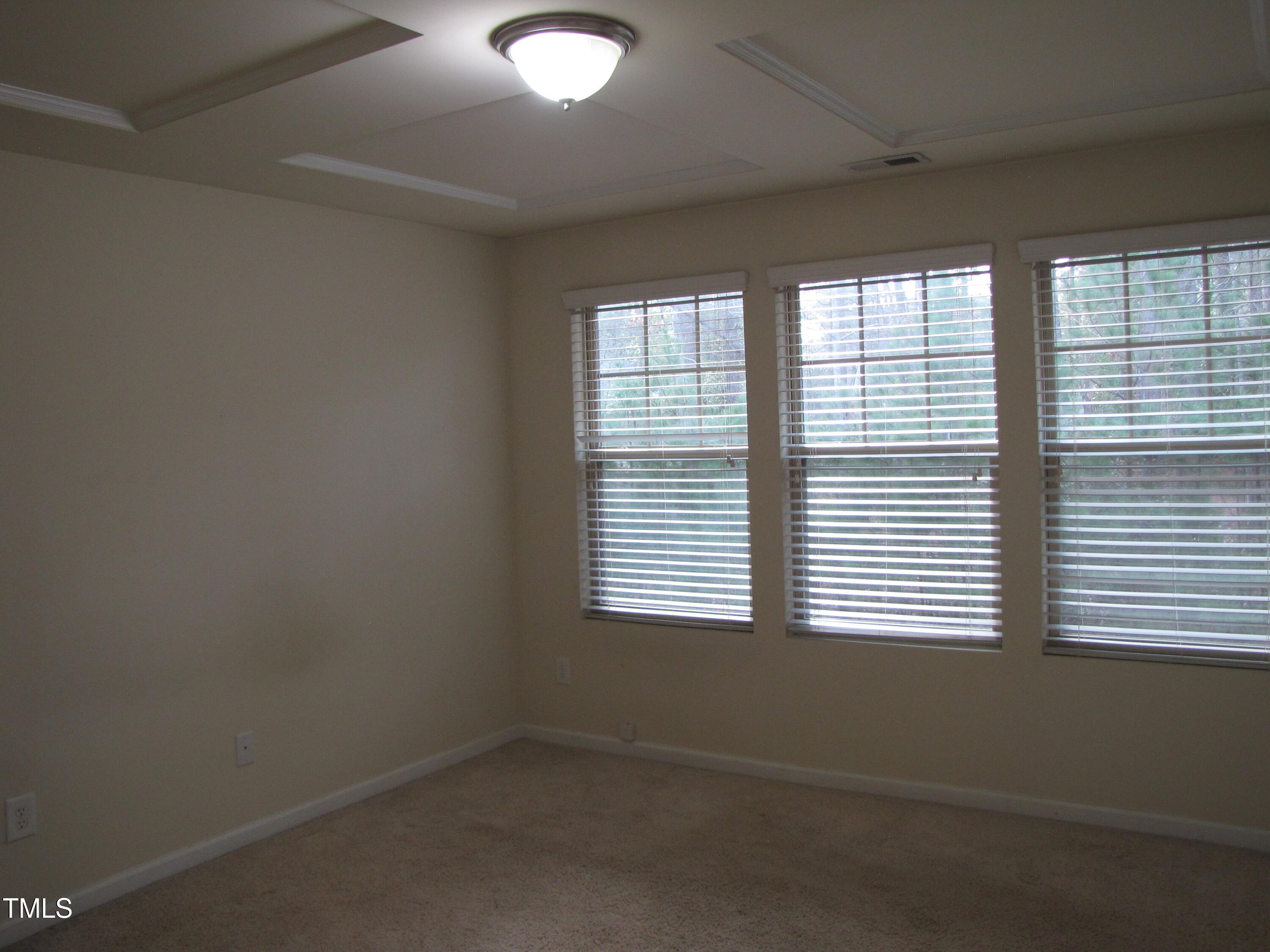 74 Pocono Drive Durham, NC 27705 - Photo 7 of 14 a view of an empty room with a window