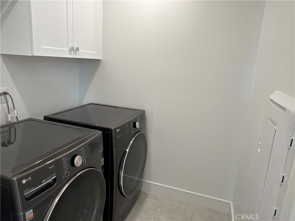 468 Palermo Lake Forest, CA 92630 - Photo 15 of 22 a utility room with dryer and washer