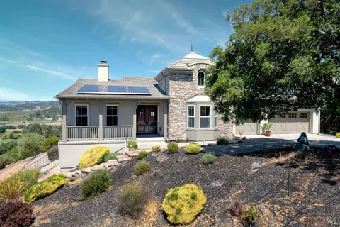 a bedroom with a bed and a mirror