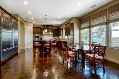 a window with a painting on the wall