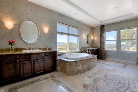 a bedroom with bed and a window