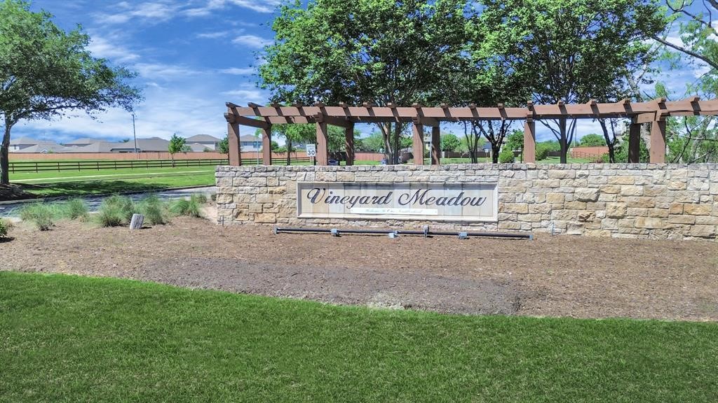 4103 Sherry Mist Lane Katy, TX 77449 - Photo 2 of 19 A charming stone entry sets the tone for Vineyard Meadow in Katy, Texas, a quiet, established community offering neighborhood amenities like a pool, playground and scenic green spaces. Ideally located near shopping, dining, and top-rated Katy ISD schools, this neighborhood blends everyday convenience with a relaxed suburban lifestyle.