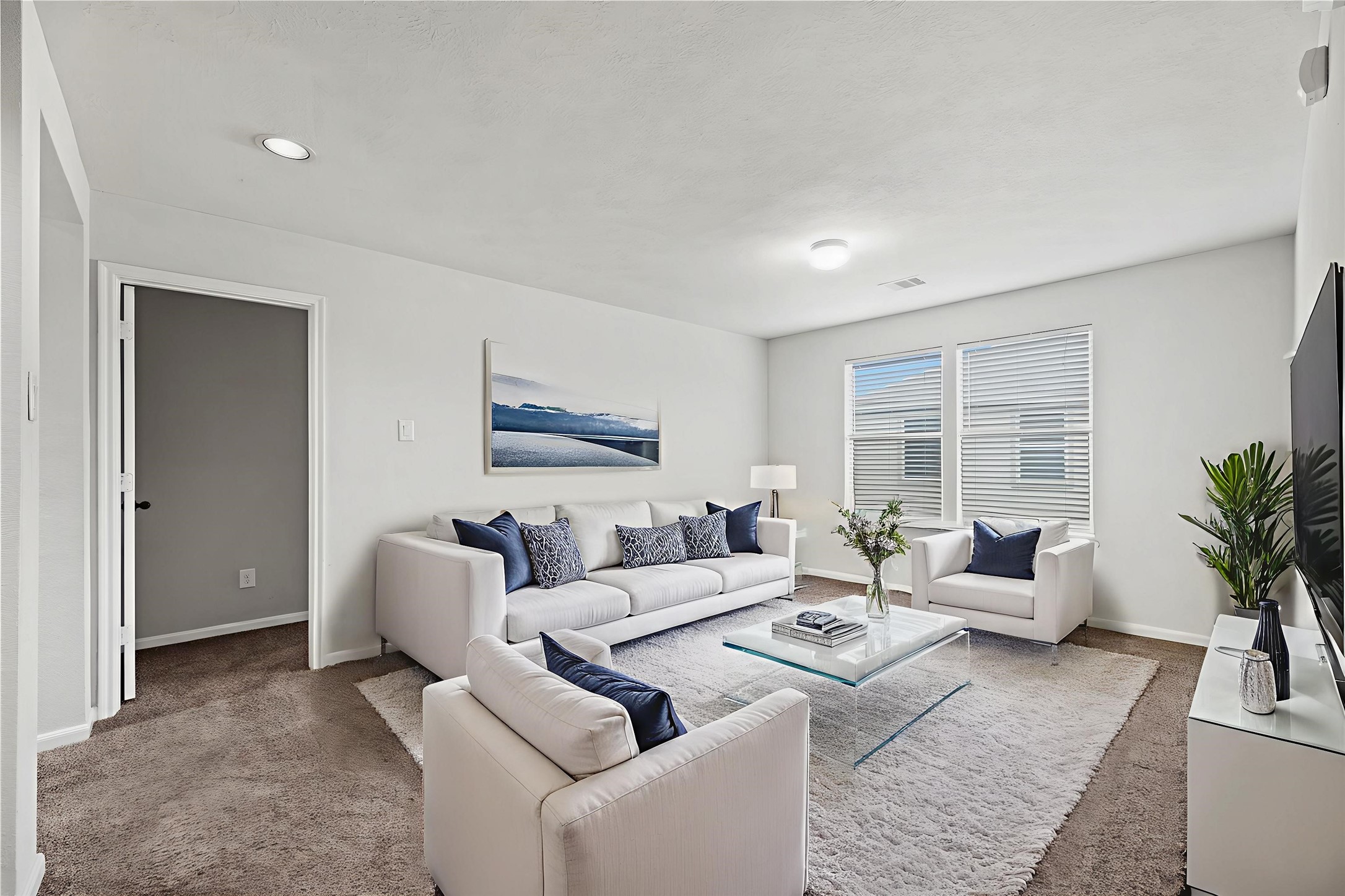 4103 Sherry Mist Lane Katy, TX 77449 - Photo 9 of 19 Enjoy a spacious game room on the second floor, thoughtfully designed with 2 large windows. Virtually staged so you can imagine the possibilities.