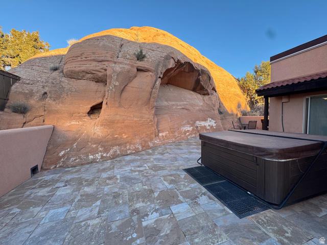 3439 Westwater Road Moab, UT 84532 - Photo 14 of 64 View of patio / terrace with a hot tub