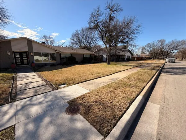 a view of a street with houses
