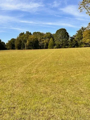 a view of an ocean and mountain