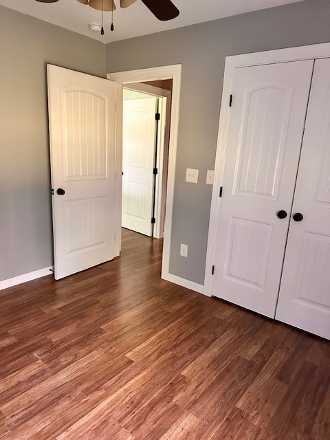 3242 Whitesell Road Culleoka, TN 38451 - Photo 7 of 17 an empty room with wooden floor and closet area