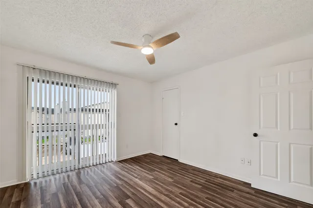 a view of a livingroom with wooden floor