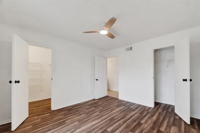 a view of a store room with racks on the wall