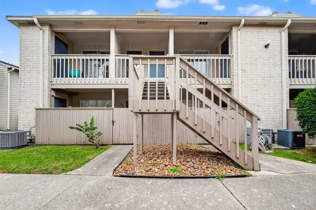 front view of balcony with a garden