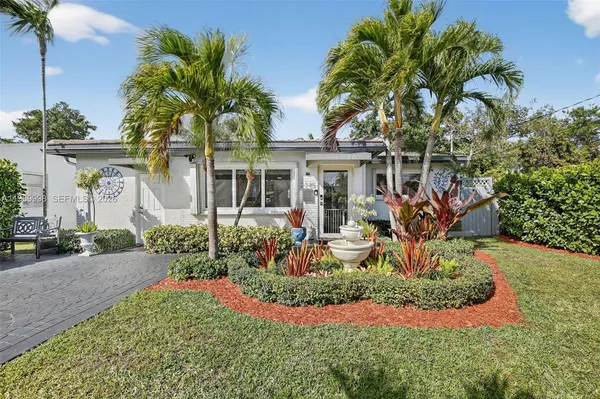 front view of a house with a small yard