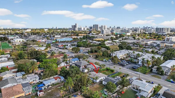 an aerial view of a city with lots of residential buildings