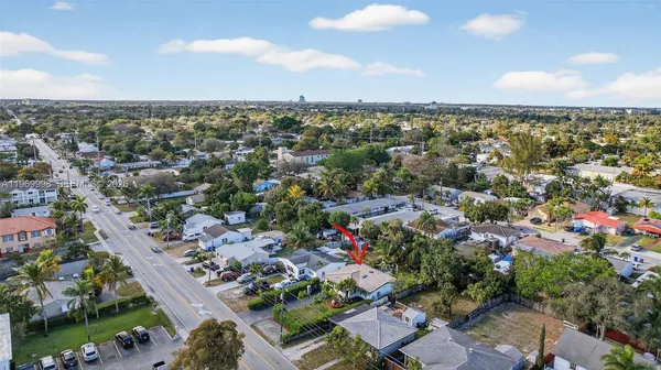 an aerial view of a city with lots of residential buildings