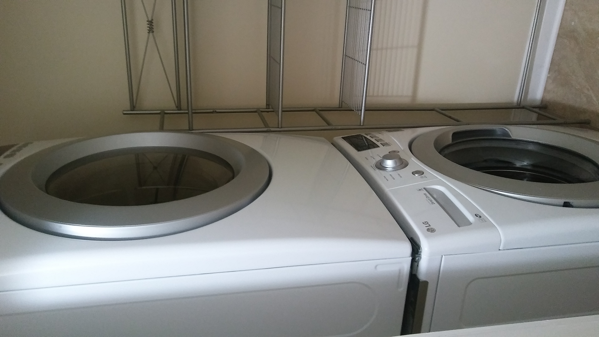 Undisclosed Address Chicago, IL 60625 - Photo 9 of 11 a utility room with dryer and washer