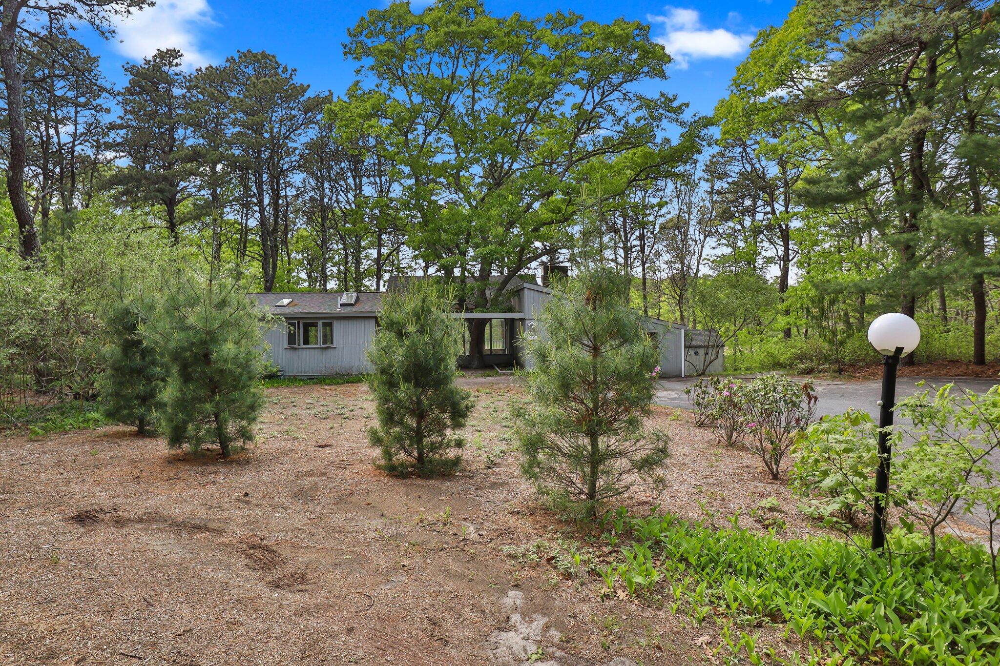 346 Setucket Road Dennis, MA 02638 - Photo 2 of 41 a view of a backyard