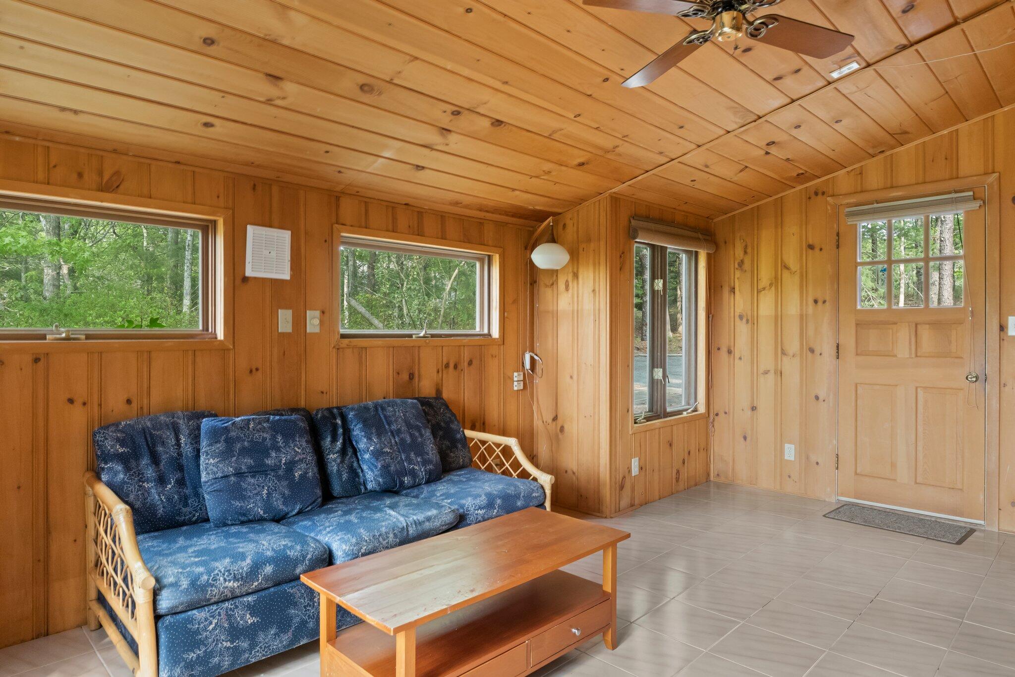 346 Setucket Road Dennis, MA 02638 - Photo 21 of 41 a living room with furniture and a window