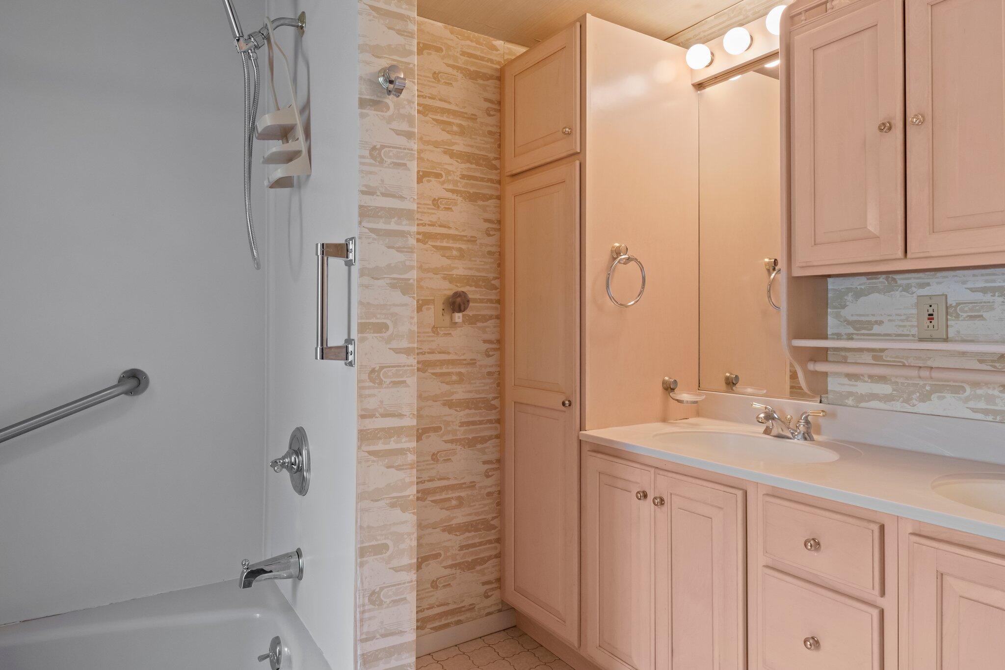 346 Setucket Road Dennis, MA 02638 - Photo 23 of 41 a bathroom with a shower sink and mirror