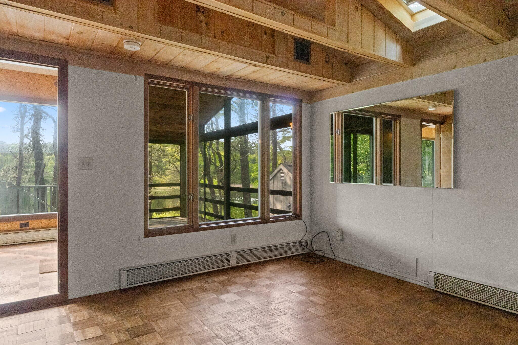 346 Setucket Road Dennis, MA 02638 - Photo 24 of 41 a view of an empty room with a window