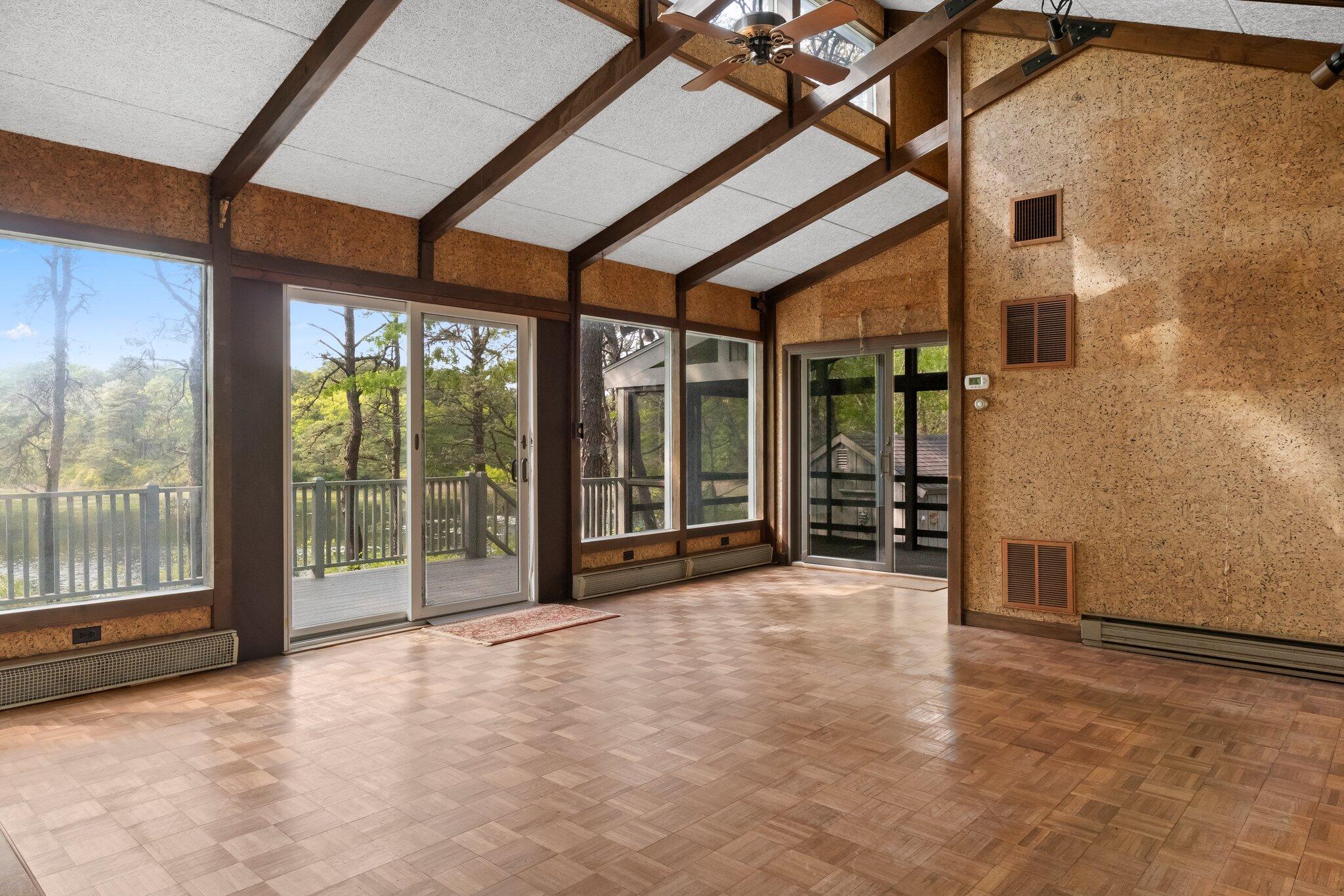 346 Setucket Road Dennis, MA 02638 - Photo 31 of 41 a view of an empty room with windows