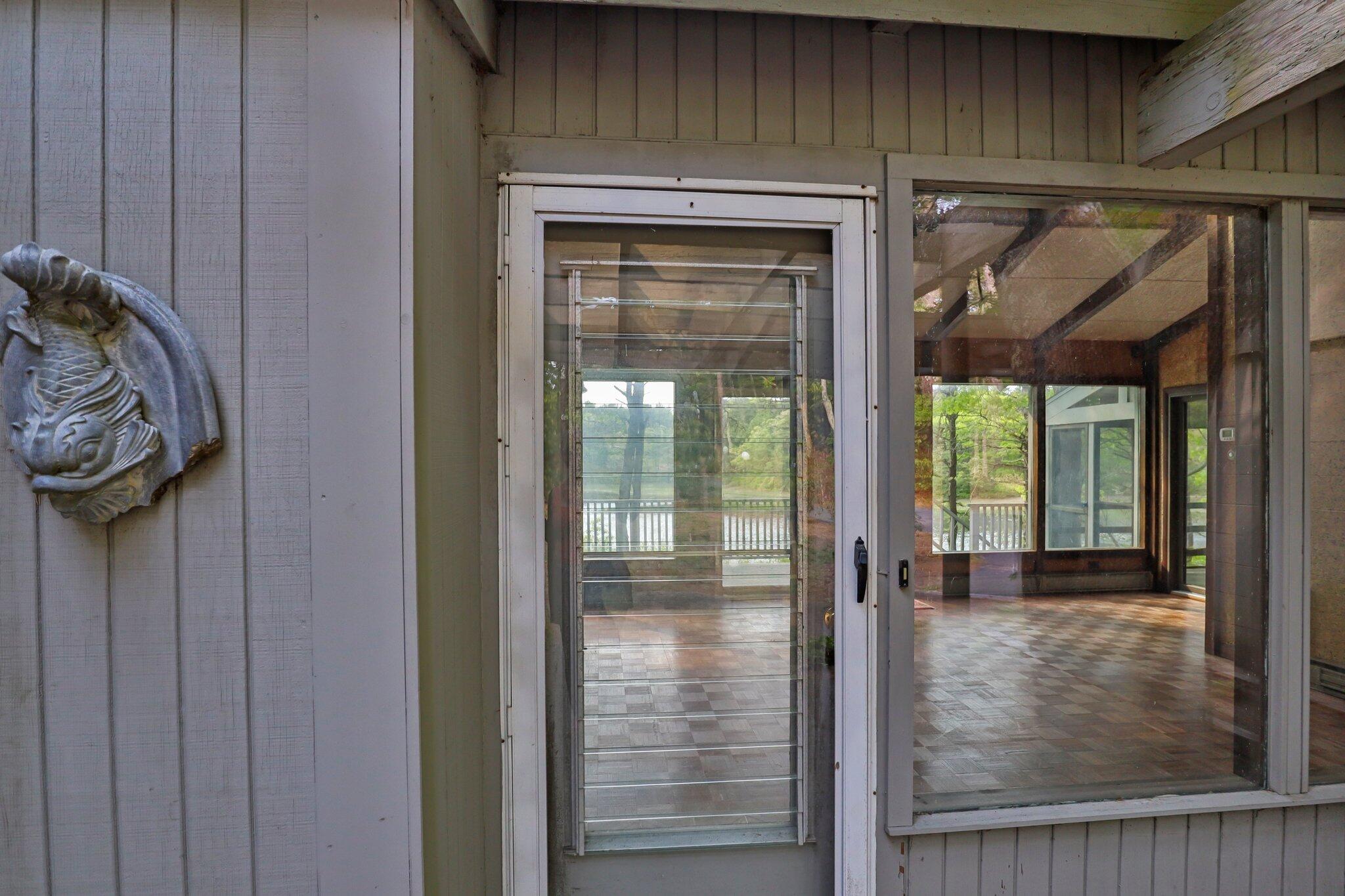 346 Setucket Road Dennis, MA 02638 - Photo 4 of 41 a view of a door and a window