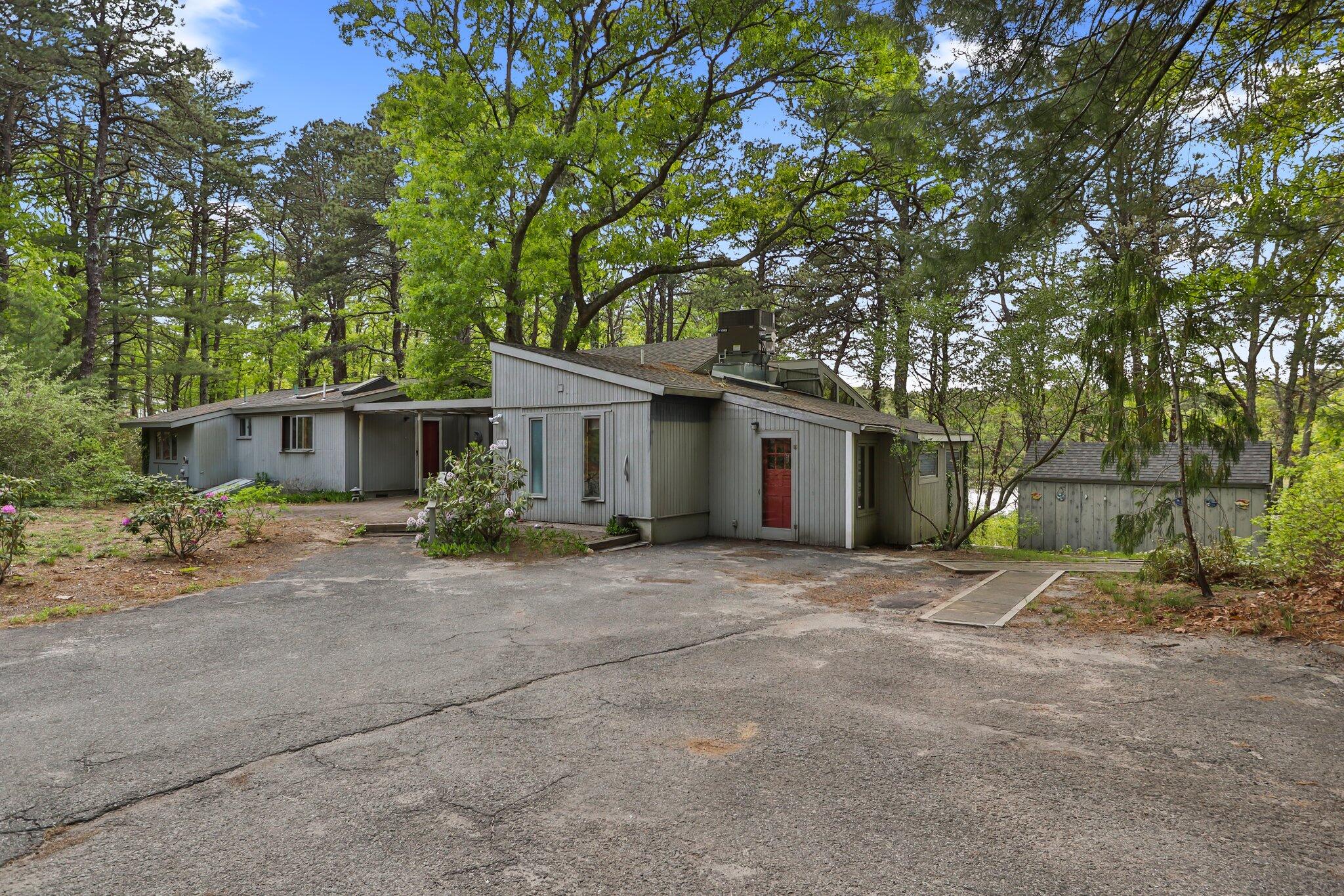 346 Setucket Road Dennis, MA 02638 - Photo 8 of 41 a view of a house with backyard and a tree