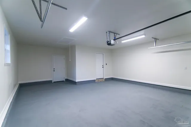 a view of a room with ceiling fan