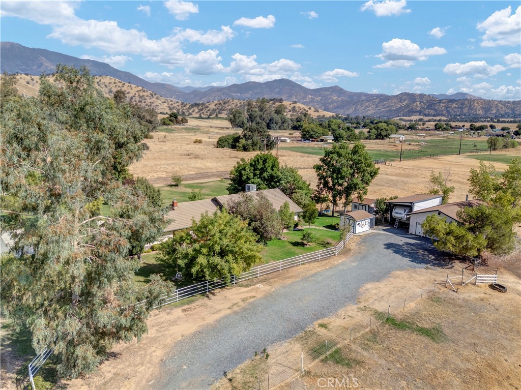 18002 Road 320 Springville, CA 93265 - Photo 12 of 56 a view of a lake with a mountain in the background