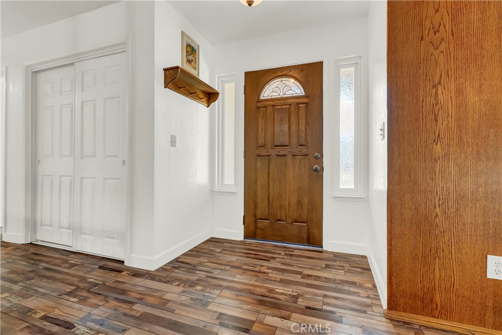 18002 Road 320 Springville, CA 93265 - Photo 17 of 56 a view of a hallway with wooden floor and a cabinet