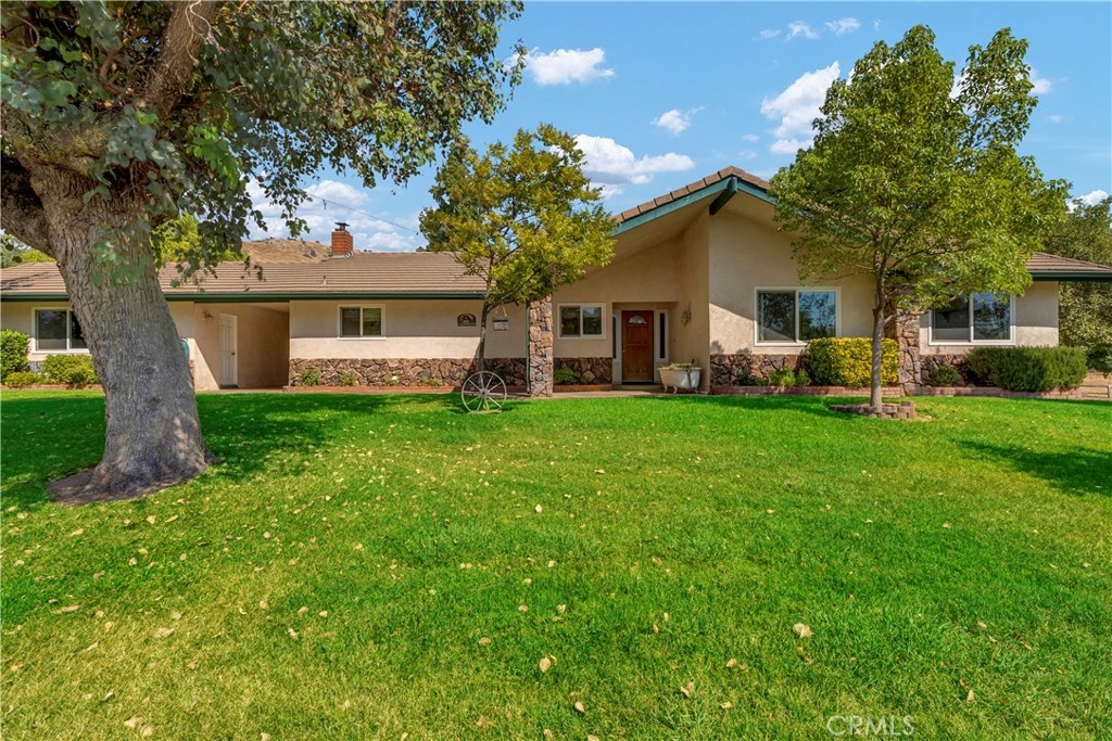 18002 Road 320 Springville, CA 93265 - Photo 3 of 57 a front view of house with yard and green space