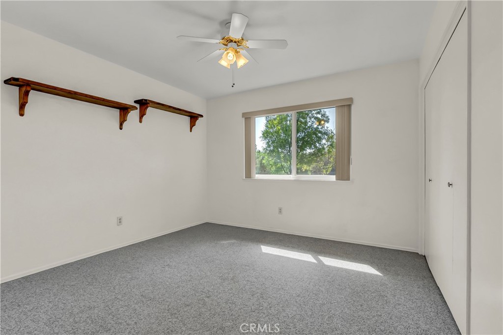 18002 Road 320 Springville, CA 93265 - Photo 35 of 56 an empty room with windows and fan