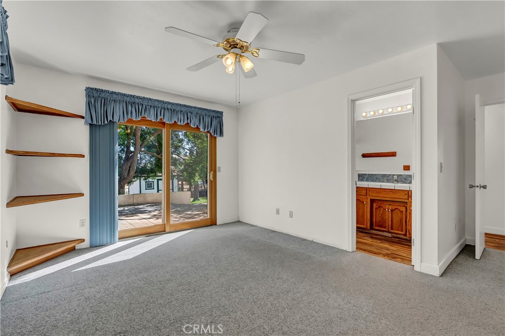 18002 Road 320 Springville, CA 93265 - Photo 41 of 56 a view of an empty room with a fireplace and a window