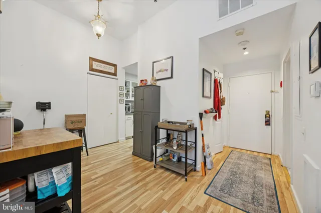 a view of a kitchen from the hallway