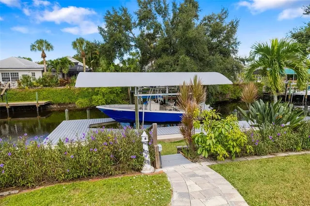 a view of a garden with sitting area
