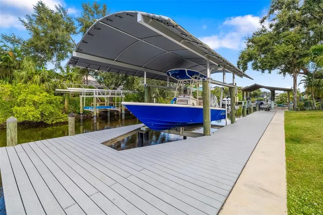 swimming pool view with a seating space
