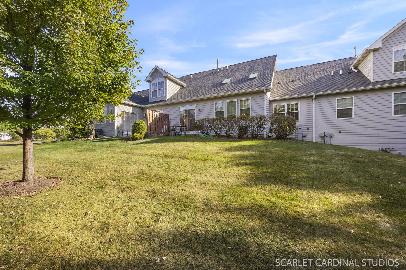869 Cambridge Drive Batavia, IL 60510 - Photo 19 of 19 a view of a house with a yard