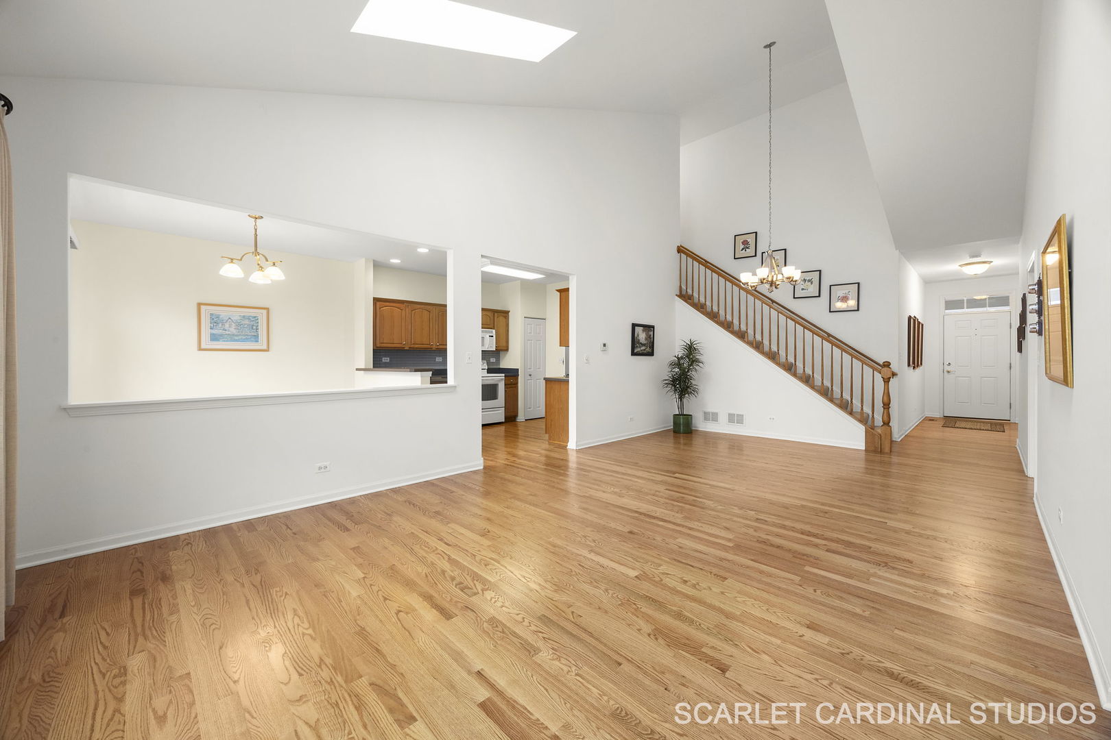 869 Cambridge Drive Batavia, IL 60510 - Photo 3 of 19 a view of a room with wooden floor